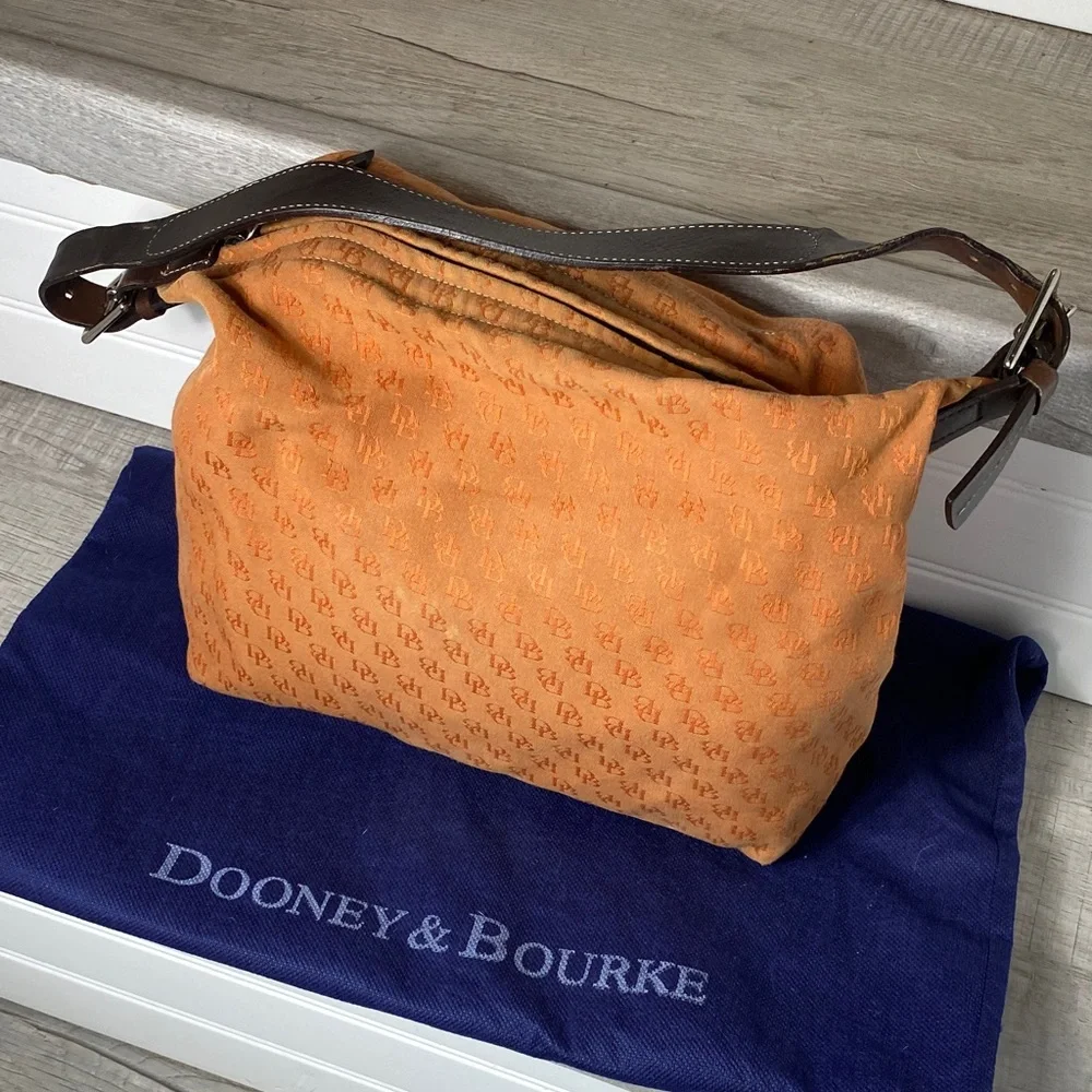 Dooney & Bourke Vintage burnt Orange over the shoulder bucket Bag